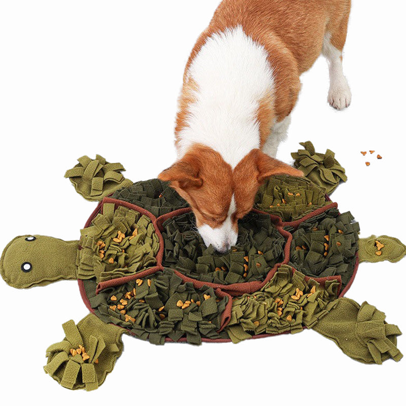 Dog sniffing the dog mat