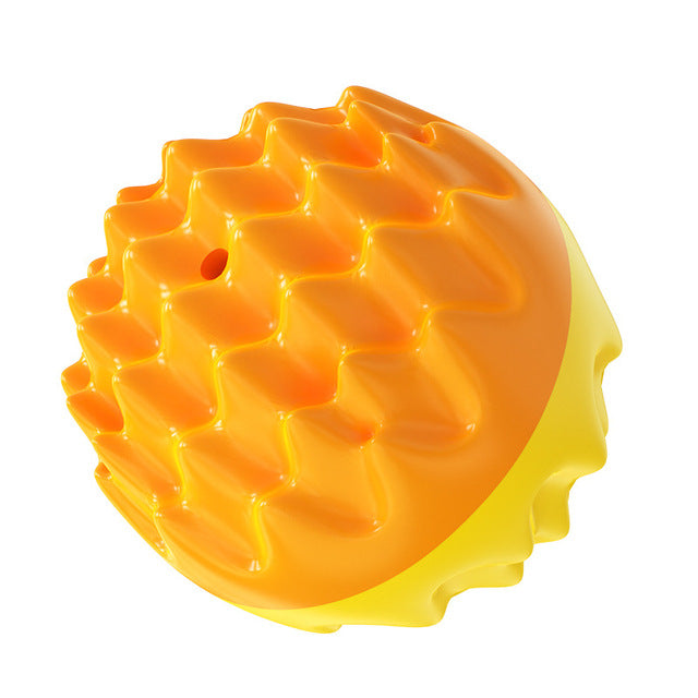 Yellow and orange dog molar ball